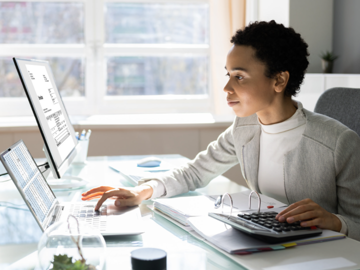 Woman using a computer to apply for a job online